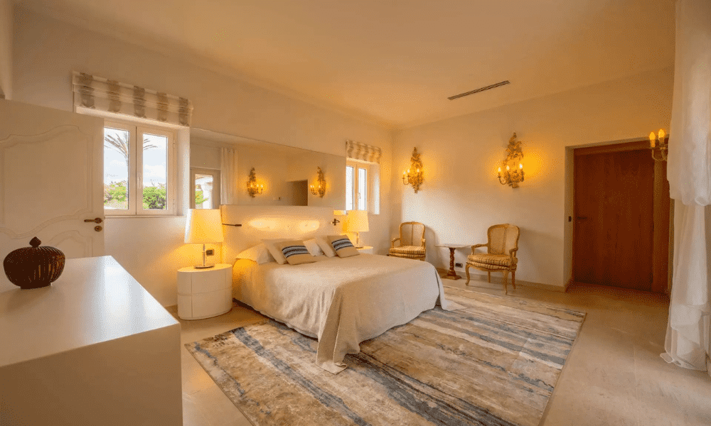 Elegant bedroom suite with sea-view balcony